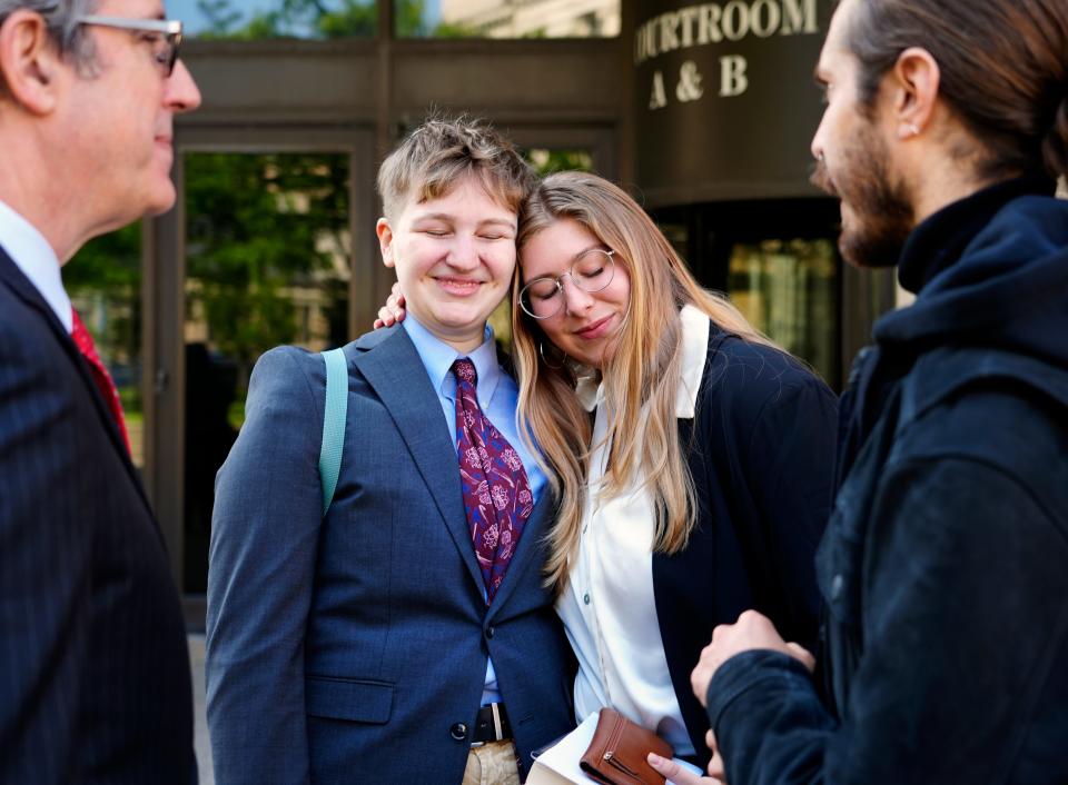 Xavier University student, Sophia Dempsey, left, and recent Xavier graduate, Julia Lankisch, hug outside the Hamilton County Justice Center in downtown Cincinnati, Monday after their arraignment for criminal trespassing. The Pro-Palestine protesters were arrested after demontrating outside the Xavier University graduation on Saturday.