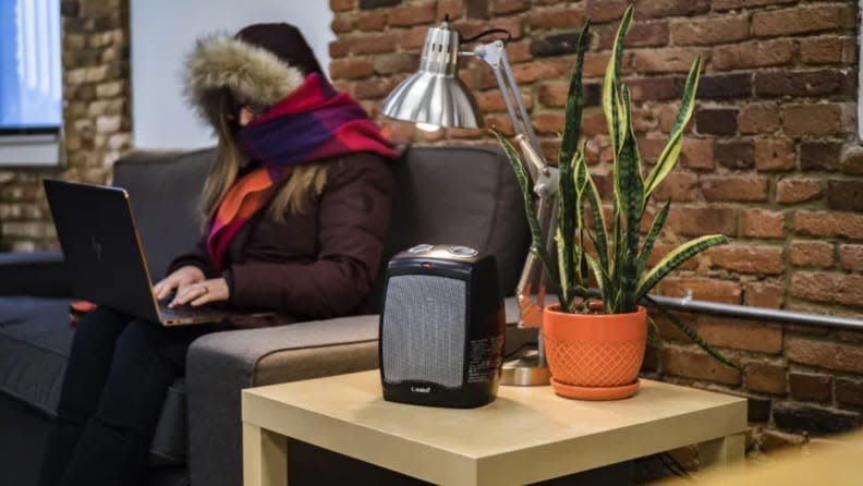 Stay warm with a comfortable sweater or a space heater.