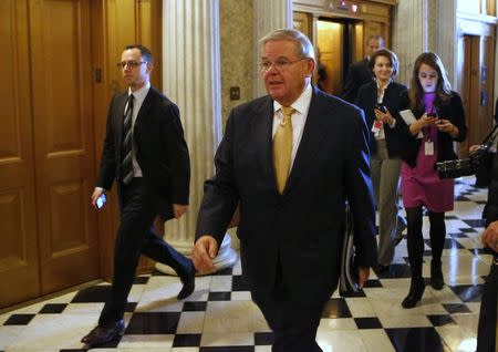 Senate Foreign Relations Committee Chairman Robert Menendez (D-NJ) walks on Capitol Hill in Washington December 9, 2014. REUTERS/Yuri Gripas