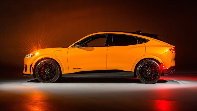 A photo of an orange Ford Mustang Mach-E.