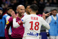 Soccer Football - Ligue 1 - Olympique Lyonnais vs Rennes - Groupama Stadium, Lyon, France - February 11, 2018 Referee Amaury Delerue speaks with Lyon's Nabil Fekir after booking him REUTERS/Emmanuel Foudrot