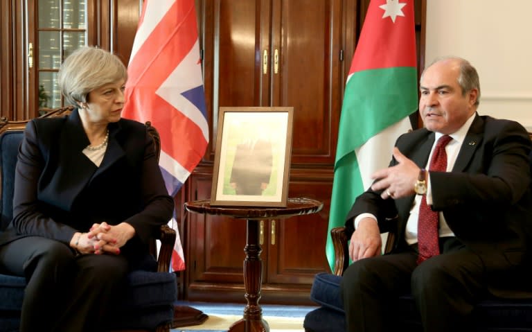 British Prime Minister Theresa May meets Jordanian Prime Minister Hani Mulqi in Amman on April 3, 2017