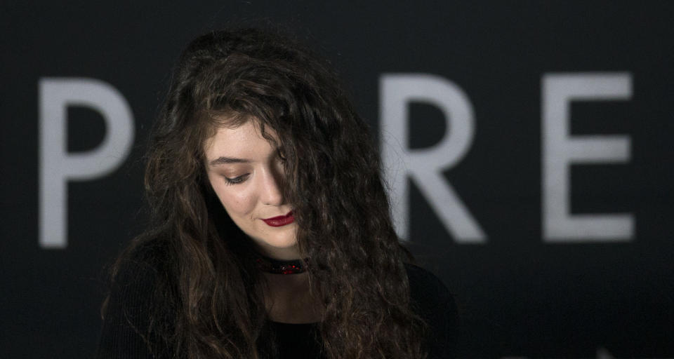 New Zealand singer-songwriter Lorde listens to questions from the press ahead of her performance in Mexico City, Mexico, Wednesday, April 9, 2014. The 17-year-old was named as a finalist in 12 categories for the Billboard Music Awards, announced on Wednesday, ahead of the May 18 awards ceremony. (AP Photo/Rebecca Blackwell)