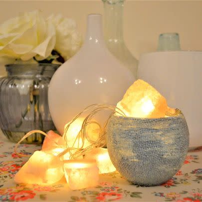 These Himalayan salt fairy lights will create a calming ~vibe~ in your bedroom – just be careful to place them out of the reach of pets!