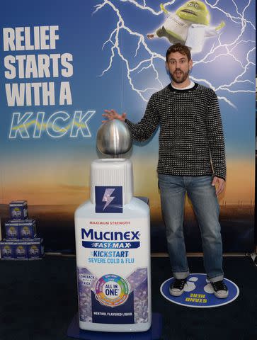 <p>Michael Simon/startraksphoto.com</p> Nick Viall hands out free coffee at the Mucinex Kickstart Cafe to help NYC commuters power through their day