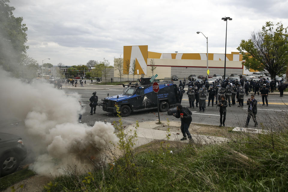 Baltimore Police officers confront protestors on Reisterstown Road near Mondawmin Mall, April 27, 2015 in Baltimore, Maryland. The funeral service for Freddie Gray, who died last week while in Baltimore Police custody, was held on Monday morning.  (Photo by Drew Angerer/Getty Images)