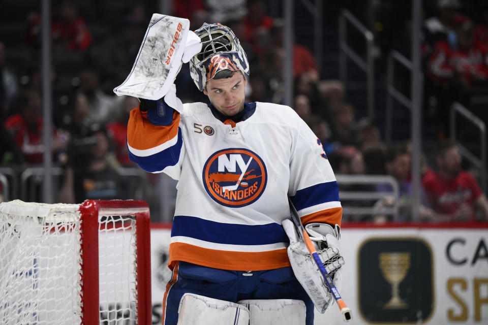 New York Islanders goaltender Ilya Sorokin looks on during a break in the action in the second period of an NHL hockey game against the Washington Capitals, Monday, April 10, 2023, in Washington. (AP Photo/Nick Wass)