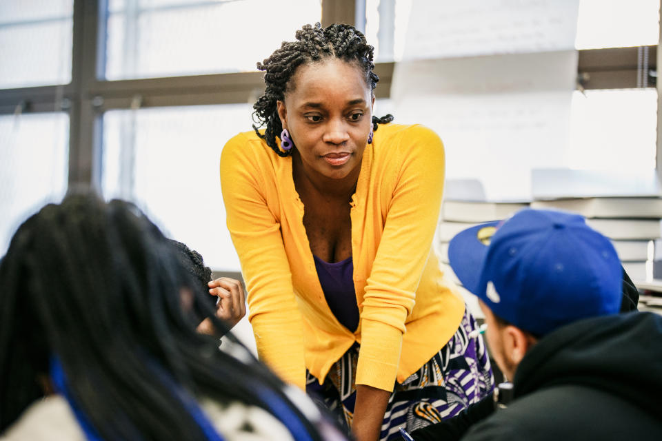 Shannah Henderson speaks to a student during Brooklyn Preparatory High School’s African American studies AP course (Marc J. Franklin / NBC News)