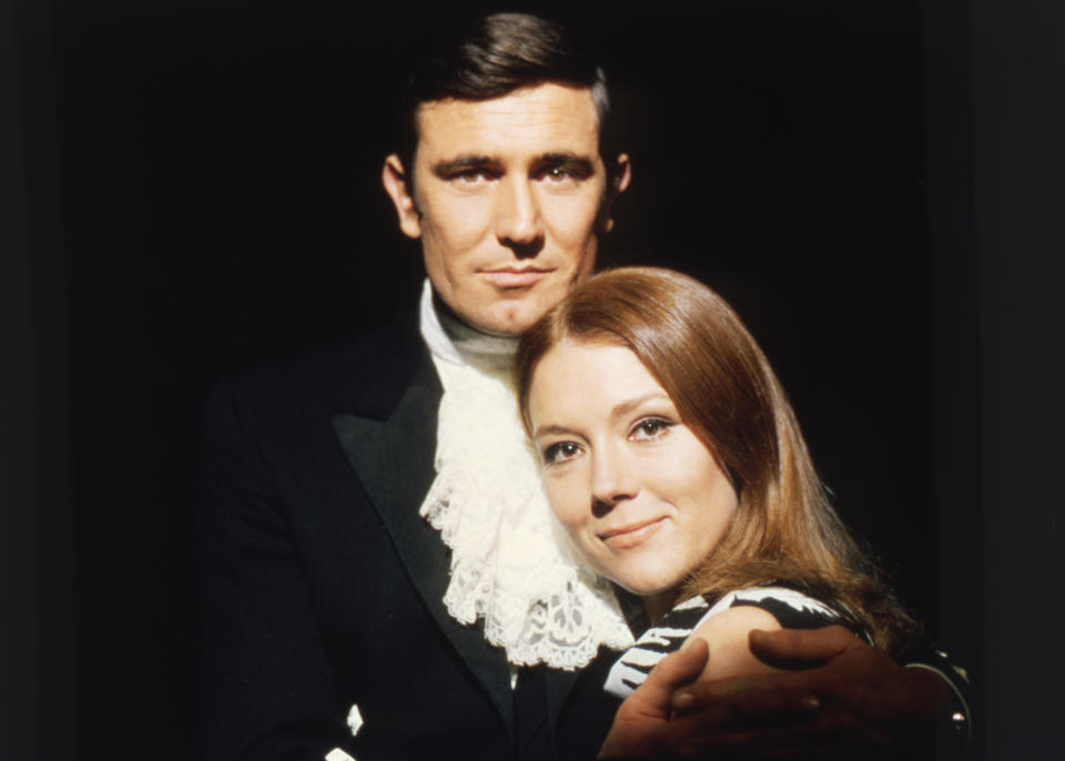 British actress Diana Rigg and Australian actor George Lazenby on the set of On Her Majesty's Secret Service, directed by British Peter R. Hunt. (Photo by Sunset Boulevard/Corbis via Getty Images)