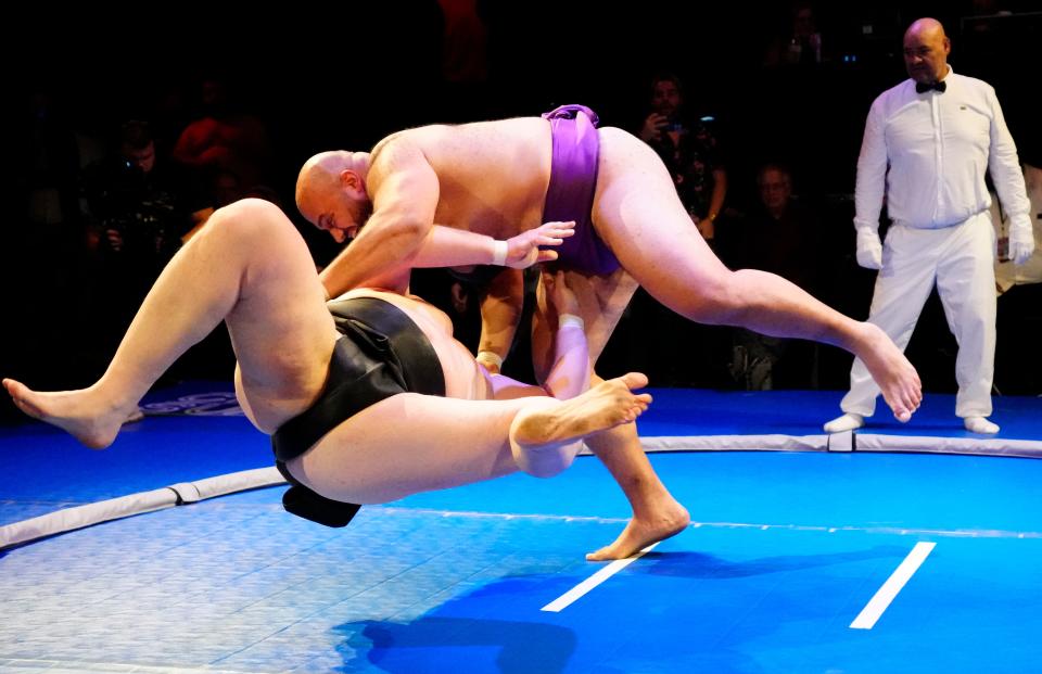 Abdelrahman "Sandstorm" Sahlan tosses Soslan Gagloev during the Club Sumo final.