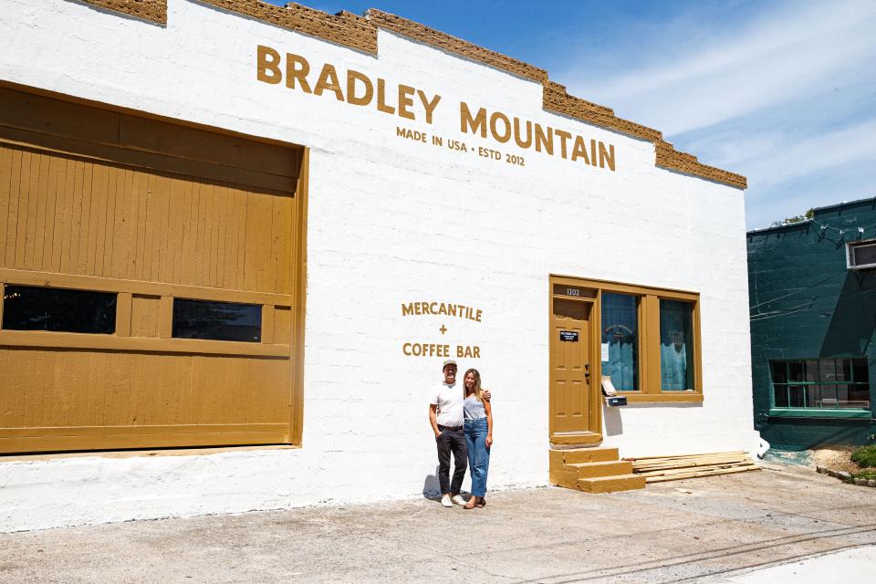 Tyler and Megs Axtell, owners and operators of Bradley Mountain, pose for a portrait in front of their new store in the arts district of Columbia, Tenn. on Tuesday, Aug. 1, 2023.