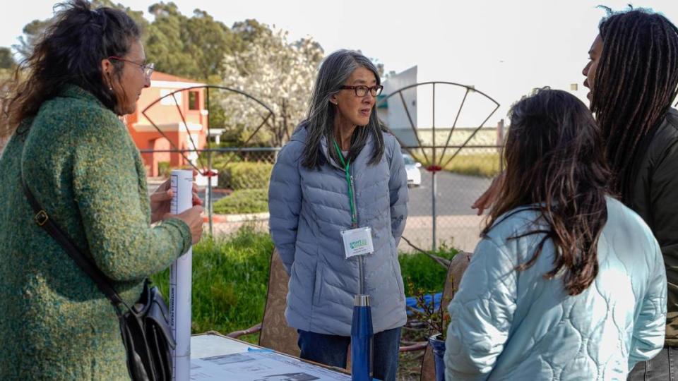 Smart Share Housing Solutions staff and volunteers speak to visitors at Wednesday’s demonstration of a model tiny home at the Waterman Village project, which would would turn Rosa Burton de Canet Adobe, a historic property on Dana Street near the San Luis Obispo Children’s Museum, into 20 units of affordable tiny homes.