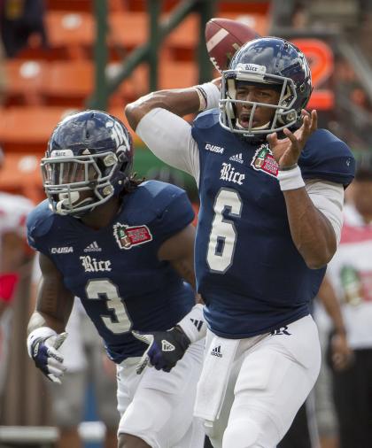 Rice quarterback Driphus Jackson (6) drops back to pass in the first quarter of the Hawaii Bowl against Fresno State, Wednesday, Dec. 24, 2014, in Honolulu. (AP Photo/Eugene Tanner)