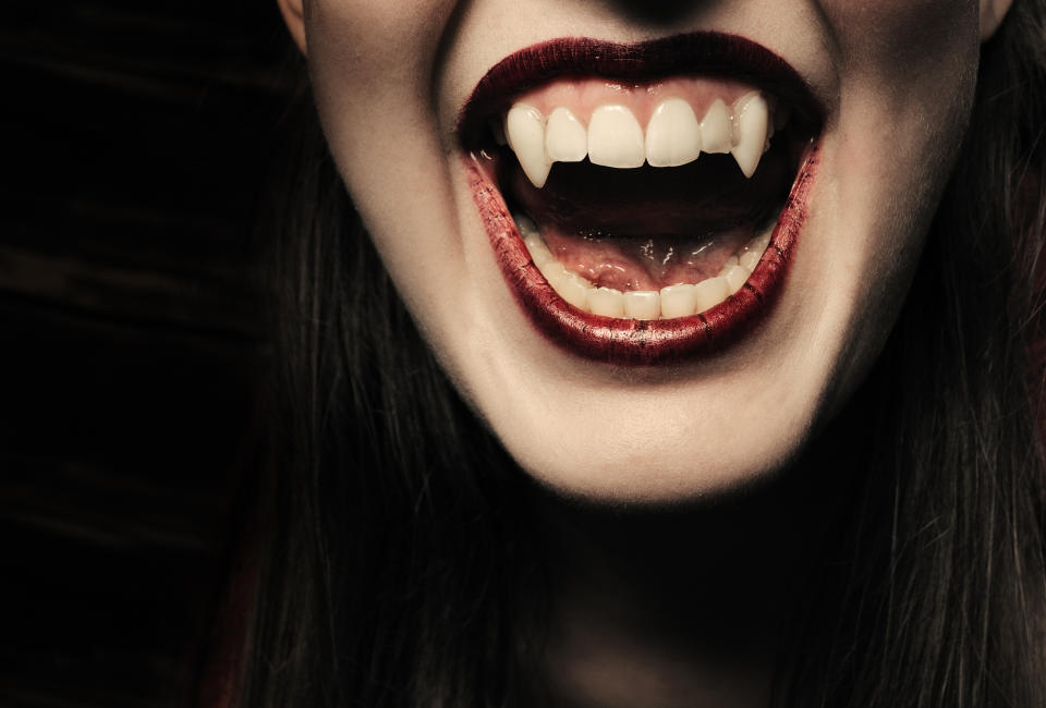 Sexy female vampire ready to bite.