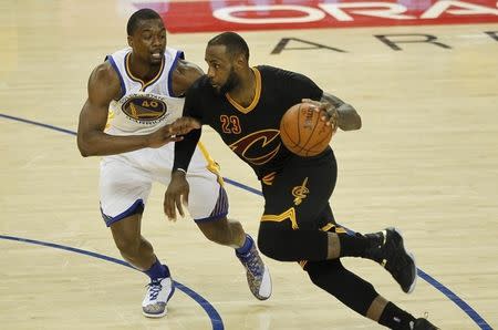 June 19, 2016; Oakland, CA, USA; Cleveland Cavaliers forward LeBron James (23) moves the ball against Golden State Warriors forward Harrison Barnes (40) in the second half in game seven of the NBA Finals at Oracle Arena. Mandatory Credit: Cary Edmondson-USA TODAY Sports