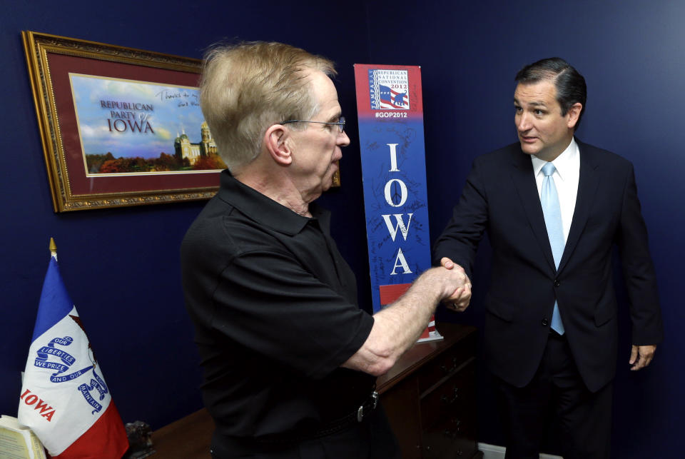 FILE-This Friday, July 19, 2013 file photo shows U.S. Sen. Ted Cruz, R-Texas, talking with Steve Scheffler, left, during a fundraising picnic for the Iowa Republican Party in Des Moines, Iowa. Having fallen short twice recently, Ohio is making a big push to land the 2016 Republican National Convention with three cities bidding as finalists, eager to reassert its Midwestern political clout to a party that may be slowly moving away from it. The three cities, Cincinnati, Cleveland and Columbus, are among eight initial finalists for the GOP convention, the most from Ohio in a single year in recent memory. (AP Photo/Charlie Neibergall, File)