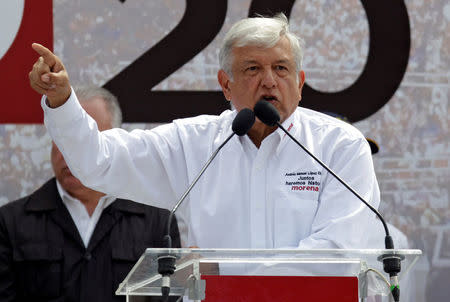 Leftist front-runner Andres Manuel Lopez Obrador of the National Regeneration Movement (MORENA) gestures while addressing supporters during a campaign rally in Nuevo Laredo, Mexico April 5, 2018. REUTERS/Daniel Becerril