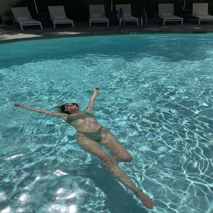 Lara swimming in one of the pools