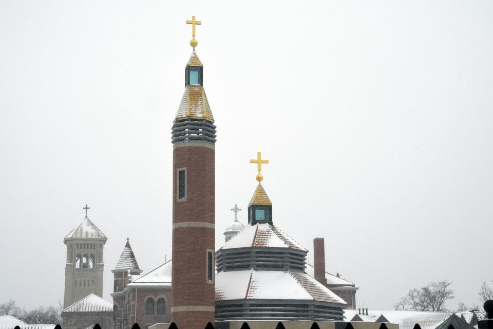 Buildings are blanketed in snow at the Archdiocese of Denver campus on Wednesday, Jan. 18, 2023. The archdiocese is being sued by a man who alleges about 100 instances of abuse at St. Elizabeth Ann Seton Church in Fort Collins, Colo., from 1998 to 2003. The lawsuit is allowed under a 2021 state law that opened up a three-year window for people to pursue litigation for sexual abuse that happened to them as children dating as far back as 1960. (AP Photo/Thomas Peipert)