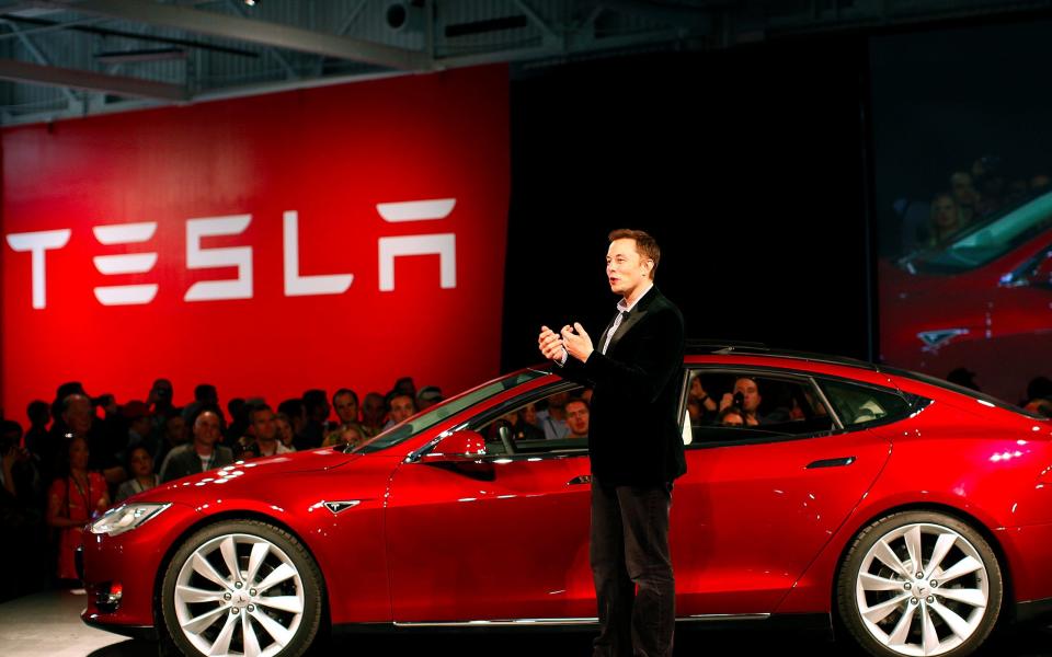 Tesla founder Elon Musk has said adding global factories could cut the cost of his electric cars