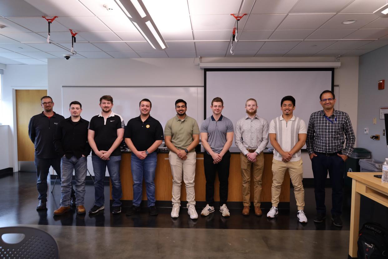 Engineering technology students take part in their capstone project. They are Jason Jordan (Whirlpool mentor), Chase B. Kennedy, Jacob N. Carey, Justin T. Hix, Jitesh Vidhani, Owen W. Peters, Justin M. Herring, Alex Cabungcal and capstone coordinator Nima Mansouri.