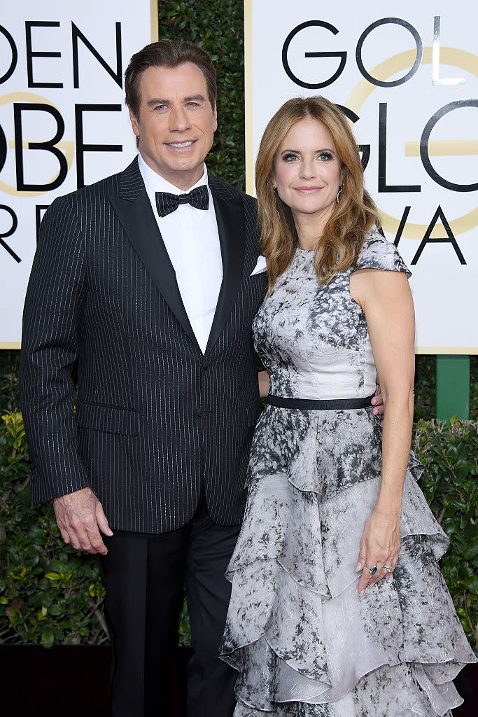 <p>John and Kelly were all smiles on the red carpet. </p>