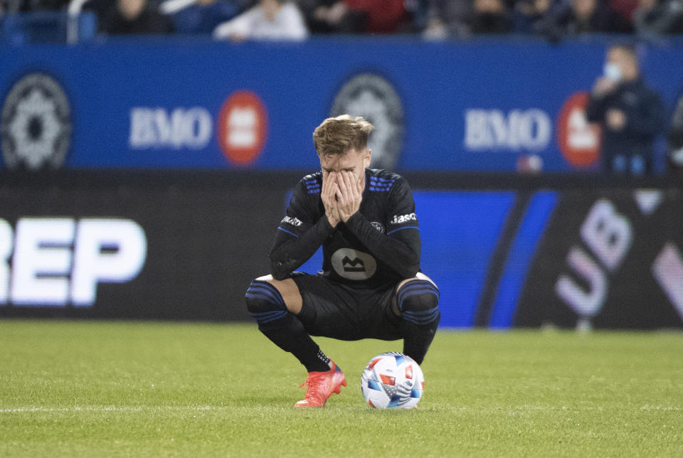 CF Montreal's Djordje Mihailovic reacts after Orlando City scored a goal during second-half MLS soccer match action in Montreal, Sunday, Nov. 7, 2021. (Graham Hughes/The Canadian Press via AP)