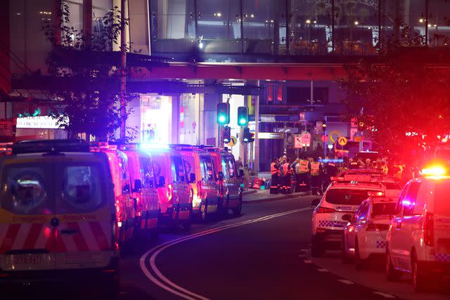 <p>Lisa Maree Williams/Getty</p> NSW police and ambulance vehicles outside Westfield Bondi Junction on April 13.