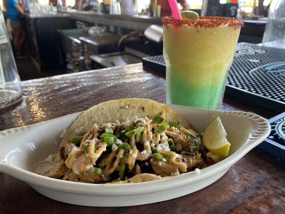 Castaways Seafood and Grill's taco and margarita trial special Mango Marley margarita and Mahi-Mahi taco.