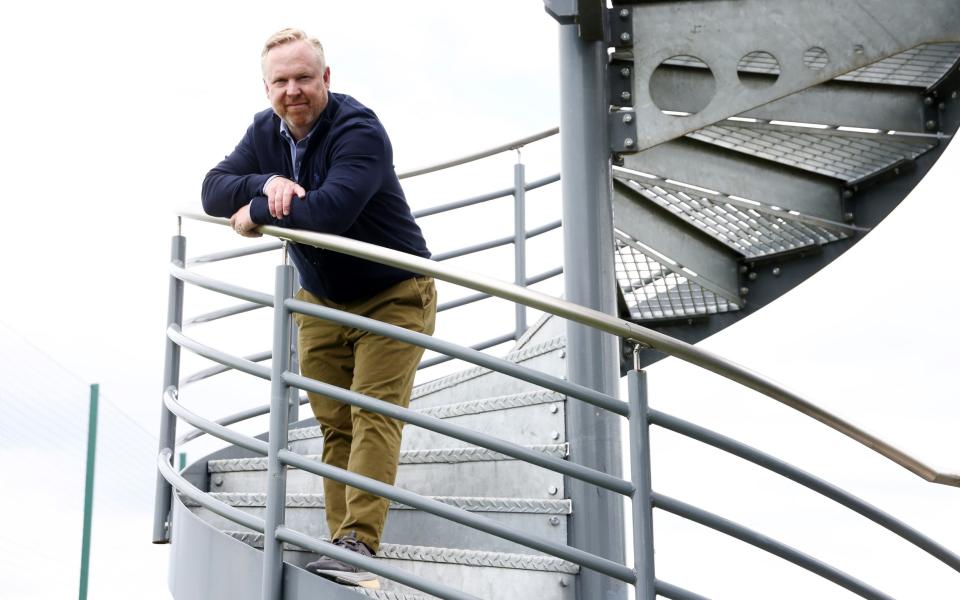 Aston Villa's president of business operations, Chris Heck poses at the Bodymoor Heath training facility