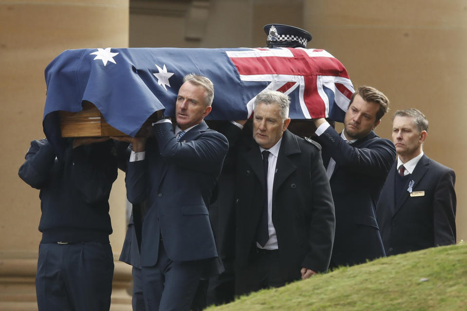 The coffin is carried to the hearse during the funeral of Constable Josh Prestney at Xavier College in Melbourne, Monday, May 4,