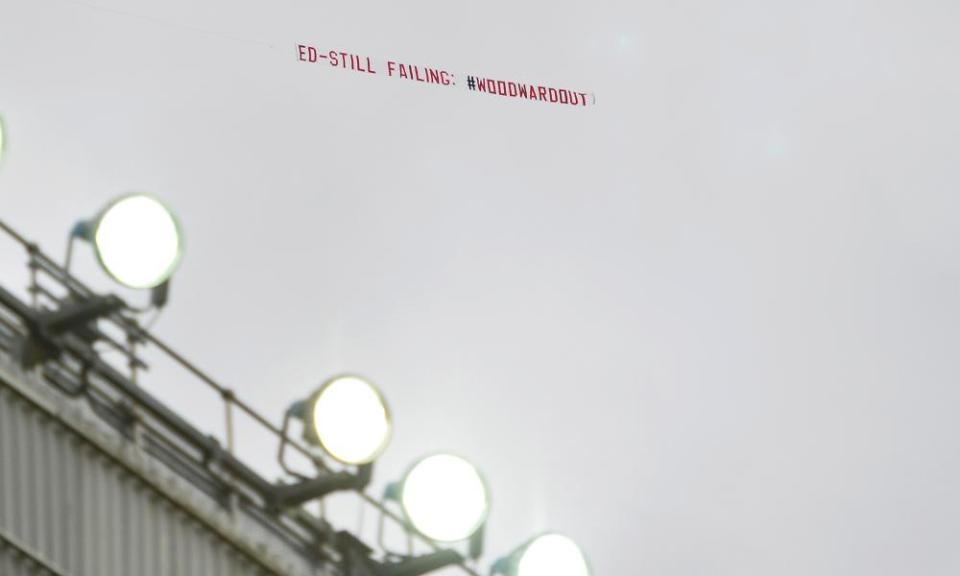 A plane carries a message over Old Trafford in October.