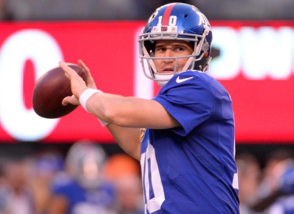 Eli Manning used his brother Peyton's recruiting experience to mold his own college choice (Photo: USA TODAY Sports Images)