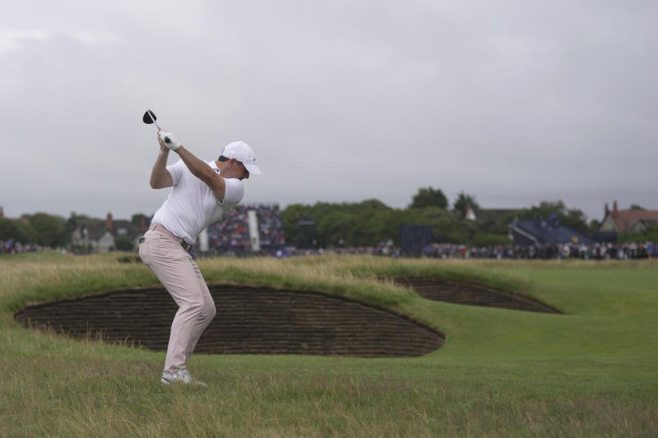 Northern Ireland's Rory McIlroy plays from the light rough on the 15th fairway during the third day of the British Open Golf Championships at the Royal Liverpool Golf Club in Hoylake, England, Saturday, July 22, 2023. (AP Photo/Kin Cheung)