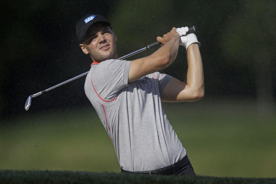 Martin Kaymer of Germany, looks at his shot from the seventh fairway during the second round of The Players championship golf tournament at TPC Sawgrass, Friday, May 9, 2014 in Ponte Vedra Beach, Fla. (AP Photo/Gerald Herbert)