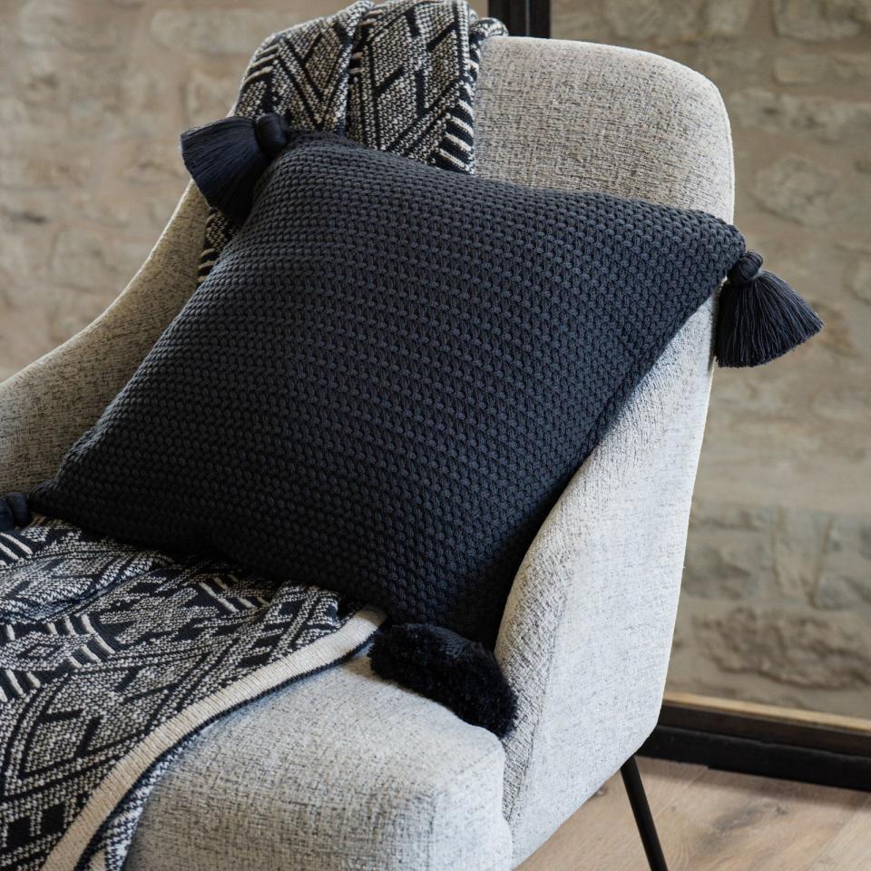 5) Charcoal Macey Tassel Pillow