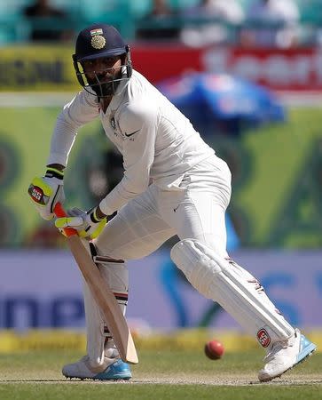 Cricket - India v Australia - Fourth Test cricket match - Himachal Pradesh Cricket Association Stadium, Dharamsala, India - 27/03/17 - India's Ravindra Jadeja plays a shot. REUTERS/Adnan Abidi