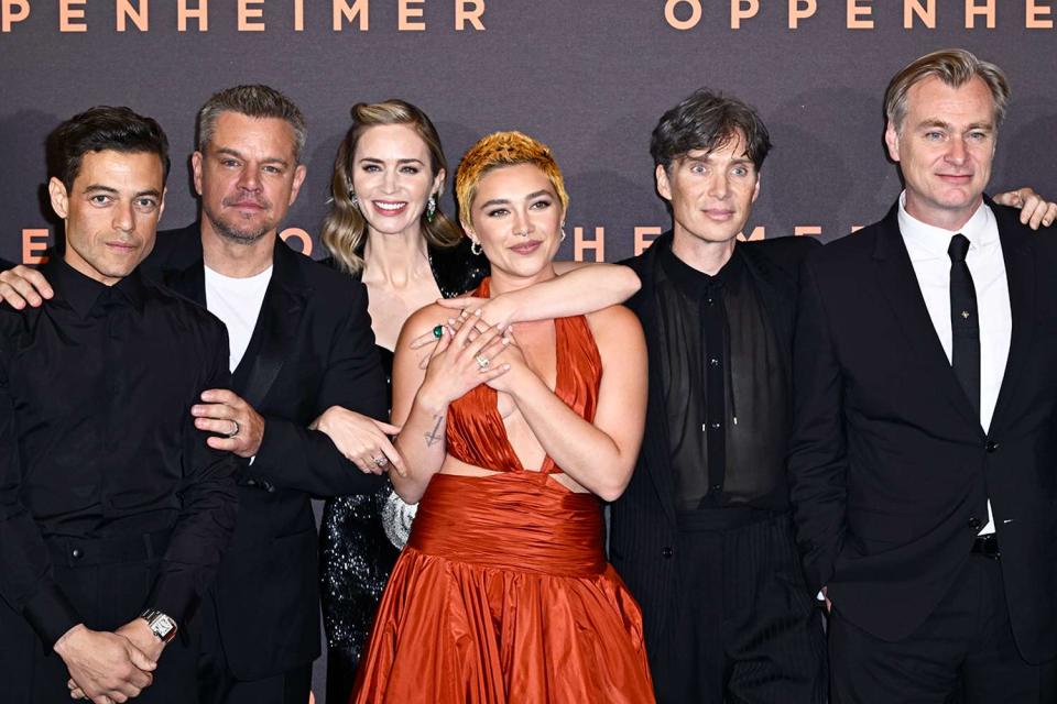 <p>Gareth Cattermole/Getty</p> Rami Malek, Matt Damon, Emily Blunt, Florence Pugh, Cillian Murphy and Christopher Nolan attend the <em>Oppenheimer</em> U.K. premiere on July 13, 2023, in London