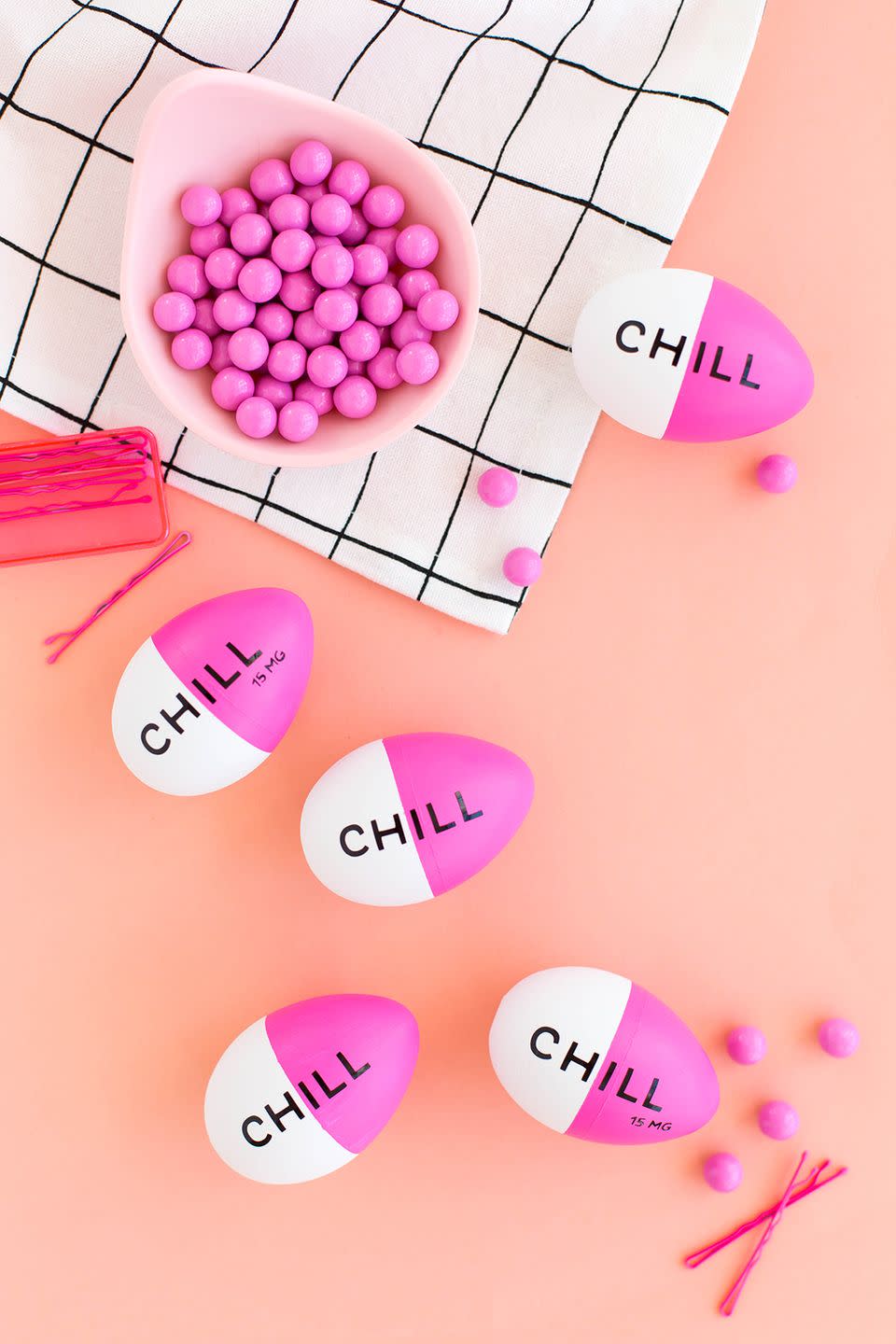 <p>Who couldn’t use a few of these? Turn your eggs into chill pills using pink acrylic paint, painter’s tape to mask off the white half, and small black letter stickers to spell out the message. </p><p><em><a href="http://www.awwsam.com/2018/03/diy-chill-pill-easter-eggs.html" rel="nofollow noopener" target="_blank" data-ylk="slk:Get the tutorial at Aww Sam;elm:context_link;itc:0;sec:content-canvas" class="link ">Get the tutorial at Aww Sam </a></em></p>