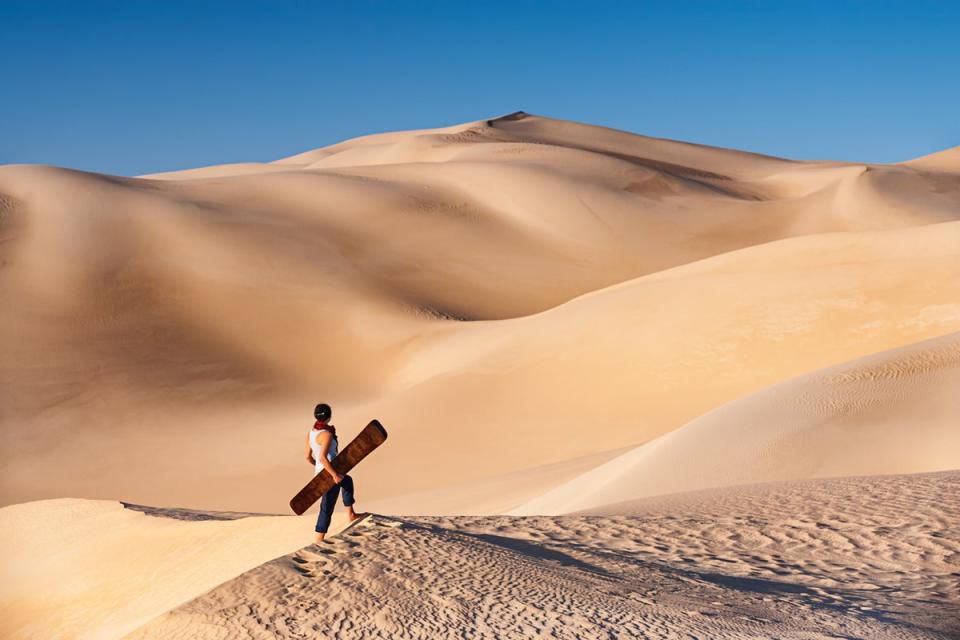 Surf the Saharan dunes in style (Getty Images)