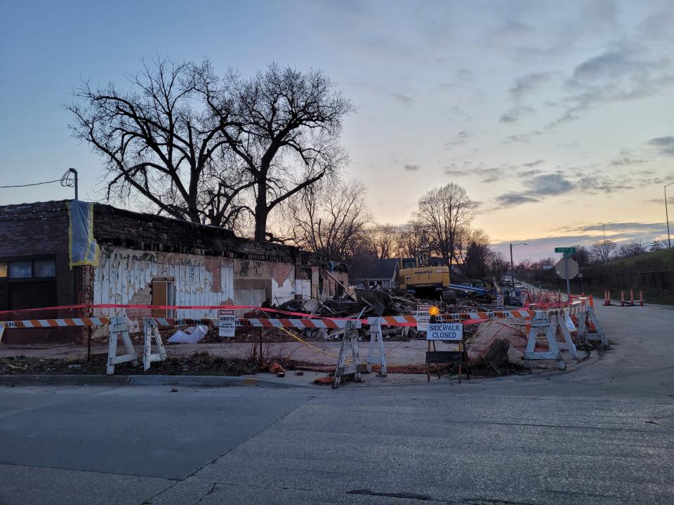 The partially demolished remains of 35th Street Antiques at 35th Street and Rollins Avenue in Des Moines. The building burned in February 2023.