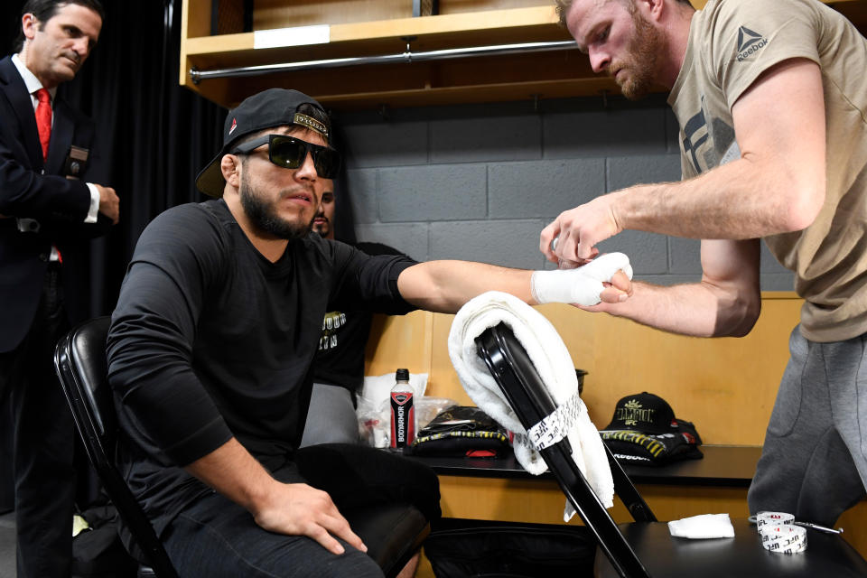 CHICAGO, IL - JUNE 08:  Henry Cejudo has his hands wrapped backstage during the UFC 238 event at the United Center on June 8, 2019 in Chicago, Illinois. (Photo by Todd Lussier/Zuffa LLC/Zuffa LLC via Getty Images)