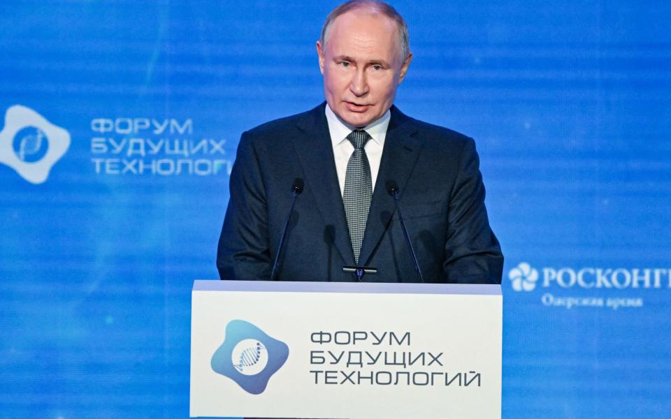 Russia's President Vladimir Putin addresses the audience during the Future Technologies Forum at the World Trade Center in Moscow on February 14, 2024