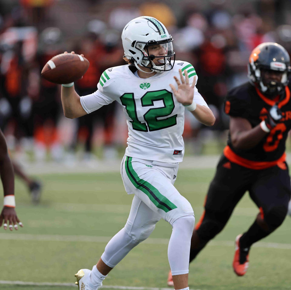 Hamilton Badin quarterback Alex Ritzie (12) throws the ball during a football game between Withrow and Badin high schools Friday, Sept. 2, 2022.