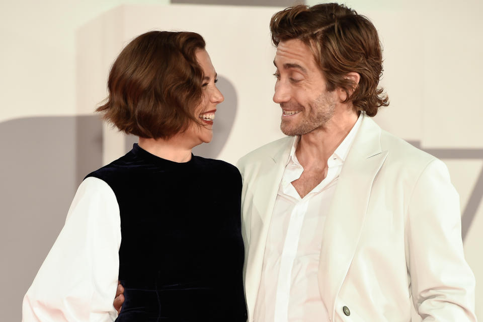 maggie and jake laughing on the red carpet