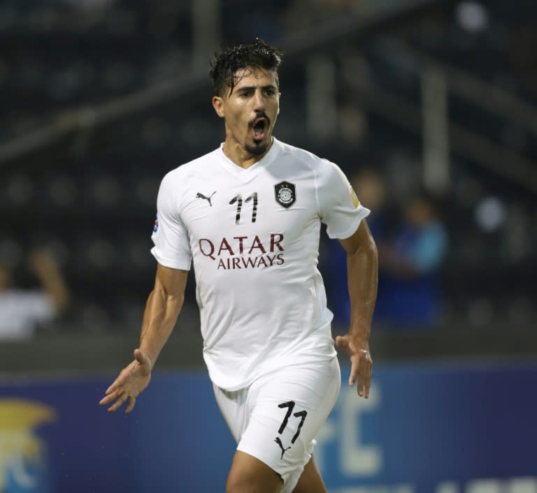 Al-Sadd's Baghdad Bounedjah celebrates his penalty