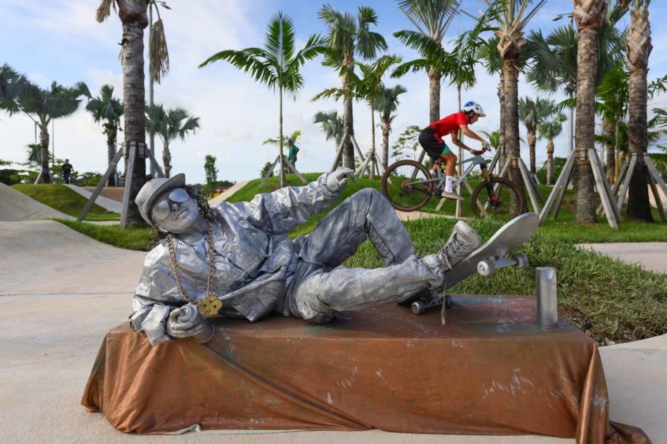 Living statue Daniela Viotti performs by the pump track of the newly inaugurated eastern portion of Doral Central Park at 3005 NW 92nd Ave. in Doral, Florida, on Monday, Aug. 26, 2024.