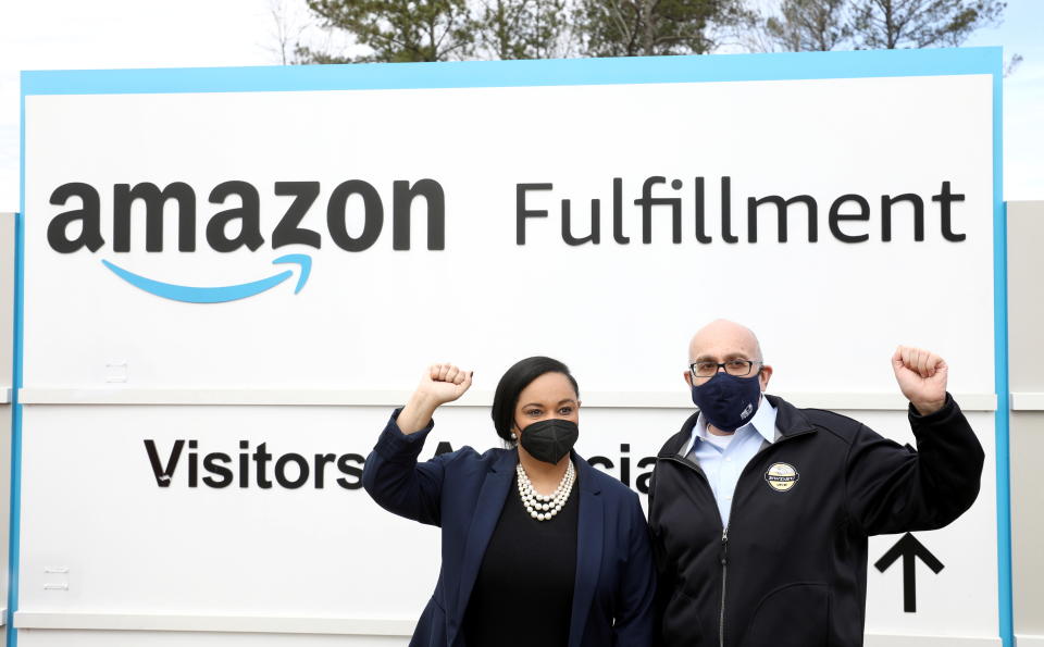 U.S. Rep. Nikema Williams and RWDSU President Stuart Appelbaum pose for a picture at the entrance to Amazon facility as they arrive as members of a congressional delegation to show their support for workers who will vote on whether to unionize, in Bessemer, Alabama, U.S. March 5, 2021.  REUTERS/Dustin Chambers REFILE - CORRECTING CITY 