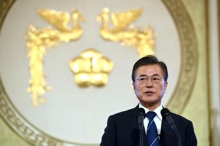 FILE PHOTO: South Korean President Moon Jae-In speaks during a press conference marking his first 100 days in office at the presidential house in Seoul, South Korea August 17, 2017. REUTERS/Jung Yeon-Je/Pool/File photo NO RESALES. NO ARCHIVES