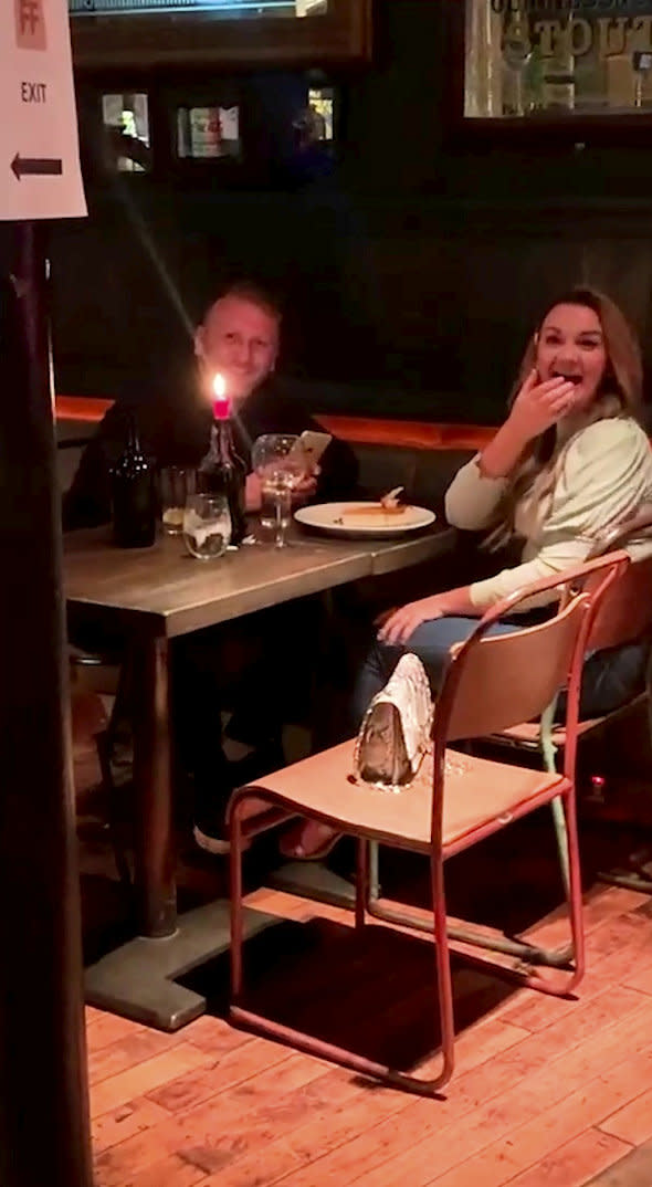 A prankster stitched up a pal on a first date - by ordering a dessert to his table with a plate decorated to read 'Will you marry me?'